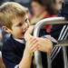 Five-year-old Kenyon Bushinski, of Jackson, waits for the team to take the court at Crisler Center on Tuesday. Melanie Maxwell I AnnArbor.com